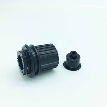 Corps de roue libre DT Swiss 3 cliquets Shimano Microspline VTT blocage rapide HWYABM00S8811S